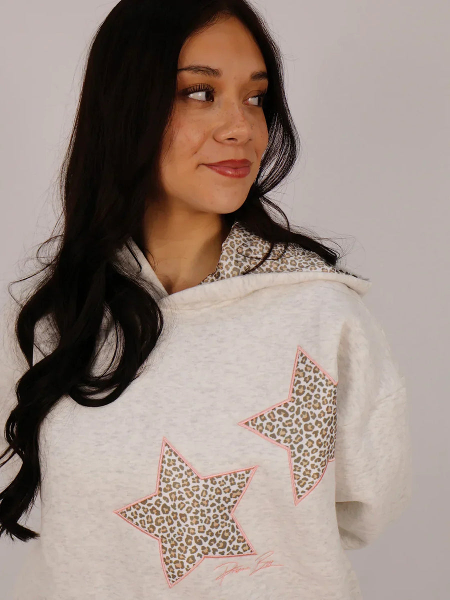 Sudadera con capucha y estrellas animal print
