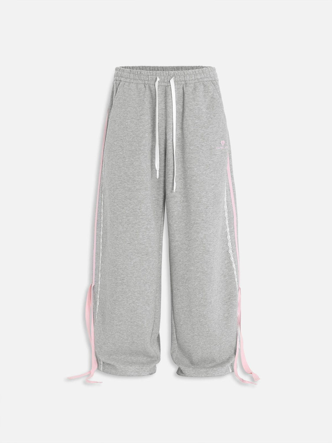 Pantalón baggy con bandas rosas y lazos laterales