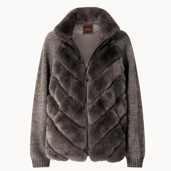 Chaleco híbrido de pelo sintético y punto con cremallera