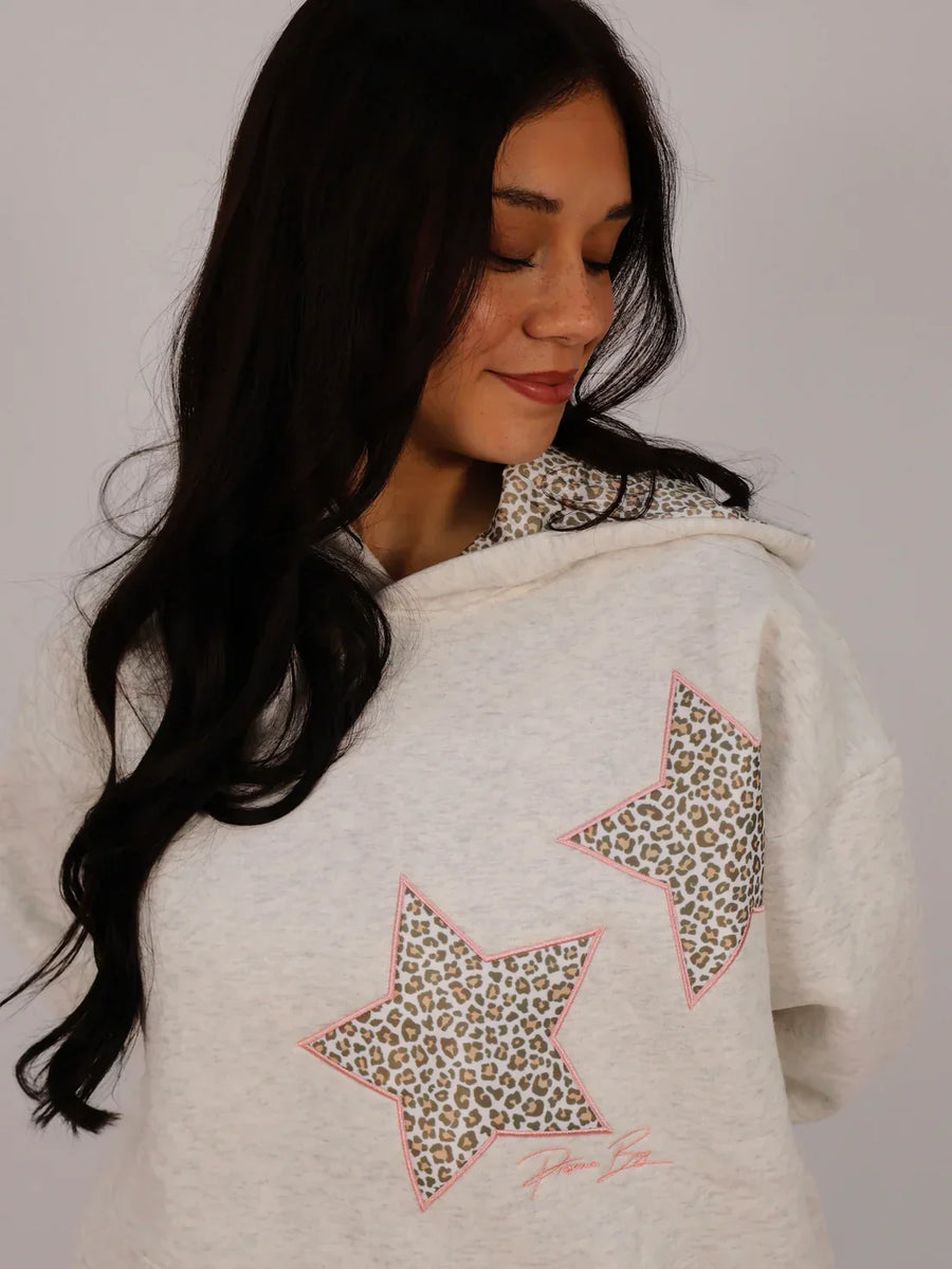 Sudadera con capucha y estrellas animal print